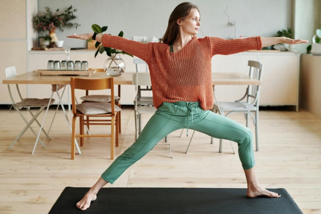 A woman doing yoga (triangle pose)